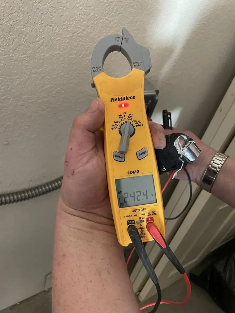 Voltage testing with clamp meter during Electrical Installation Services in Straban
